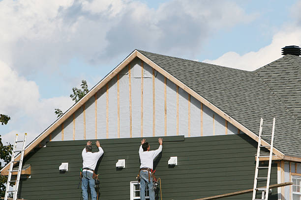 Professional Storm Damage Siding Repair technician working in Jackson Springs, NC